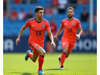K리그 축구팀 선수들이 경기장에서 맞춤 유니폼을 입고 뛰는 역동적인 모습